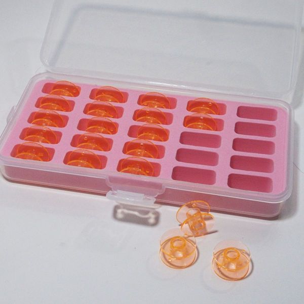 Spulenbox mit 20 Unterfaden Spulen in orange für viele gängige Nähmaschinen