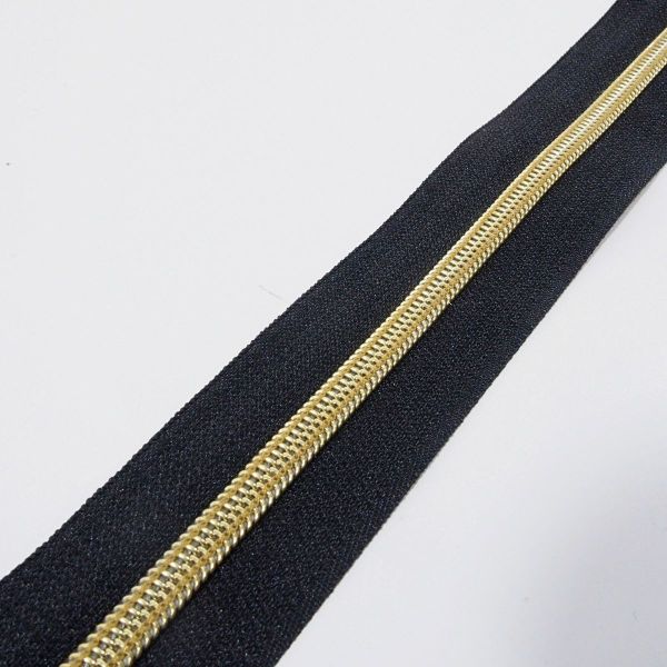 Reißverschluss endlos 5mm schwarz mit goldener Spirale – Endlosreißverschluss SR5